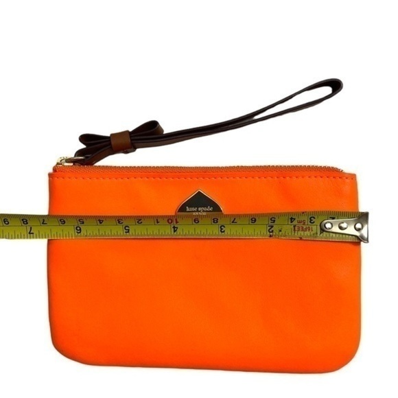 Kate spade orange wristlet bag